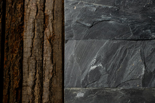 How to Mix Wood, Stone, and Upholstery in One Room Without Making It Look Busy